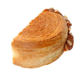 Half of round croissant with chocolate paste and nuts isolated on white. Tasty puff pastry