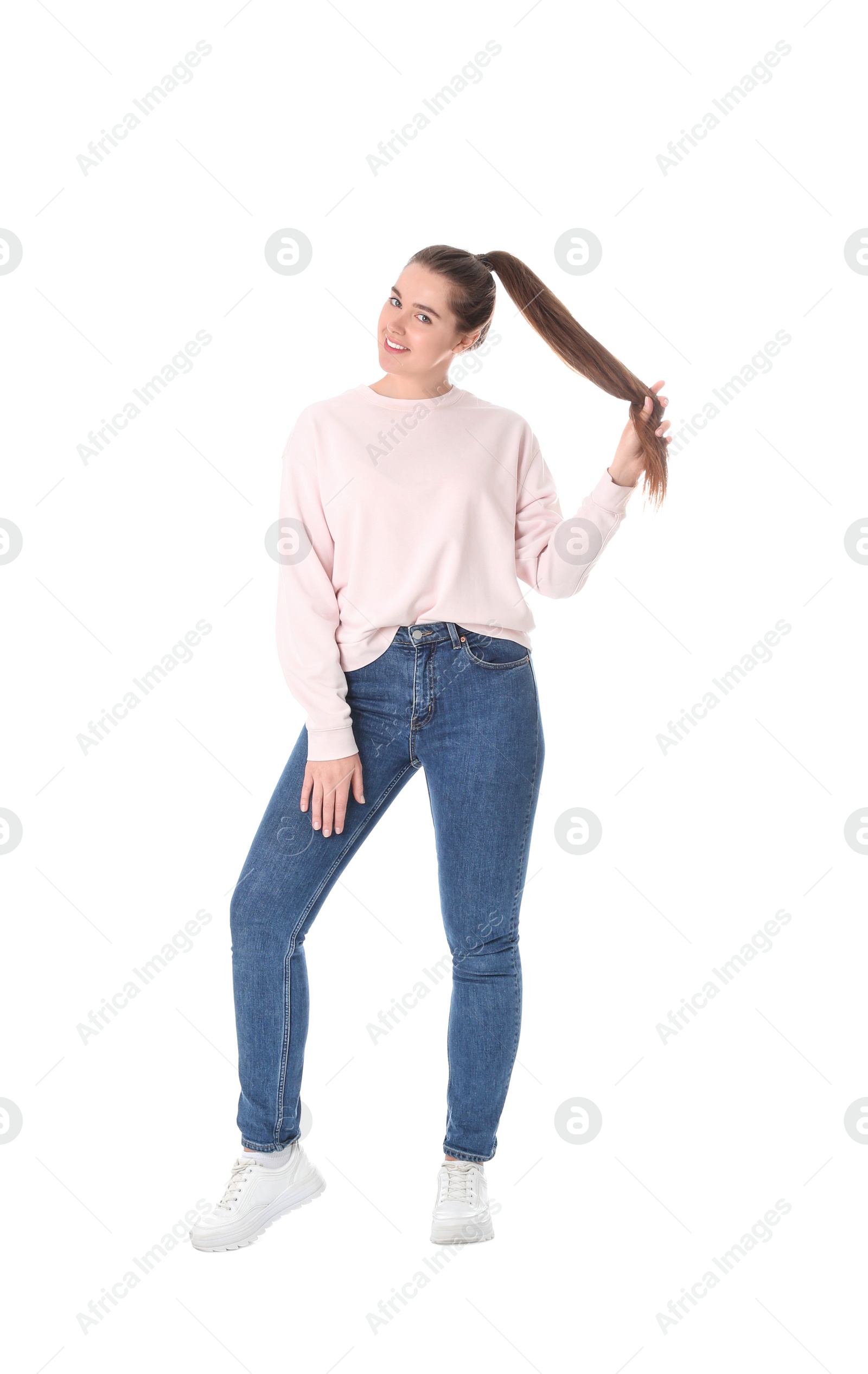 Photo of Full length portrait of young woman on white background