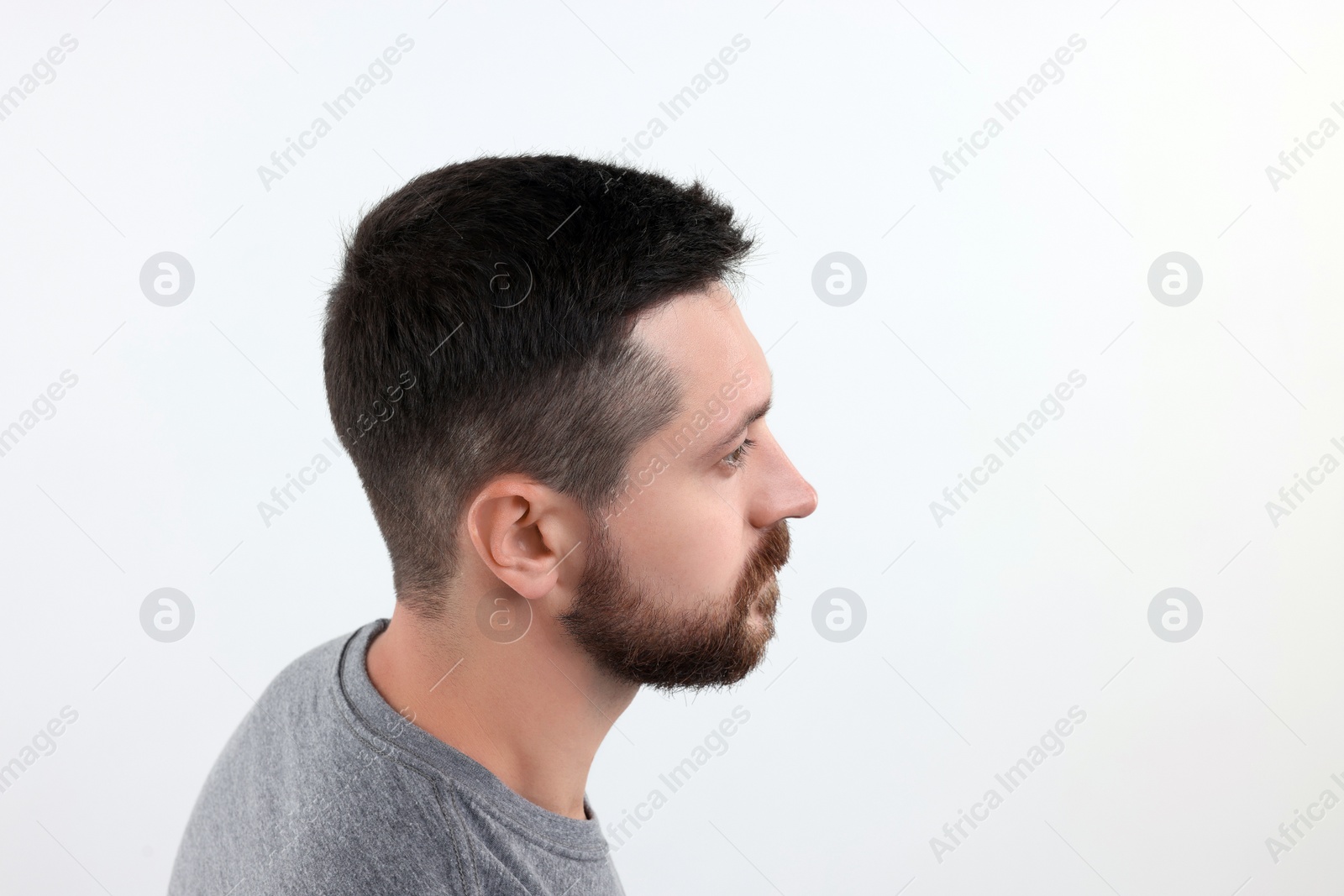 Photo of Man with healthy hair on white background. Space for text
