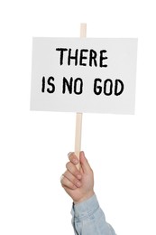 Atheism. Man holding sign with text There Is No God on white background, closeup