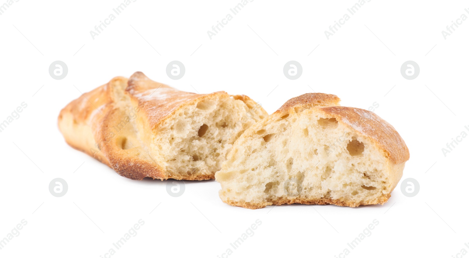 Photo of Pieces of fresh baguette on white background