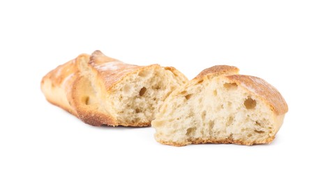 Photo of Pieces of fresh baguette on white background