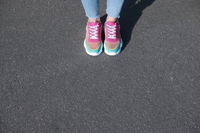 Woman standing outdoors, closeup with space for text. Choosing way concept.