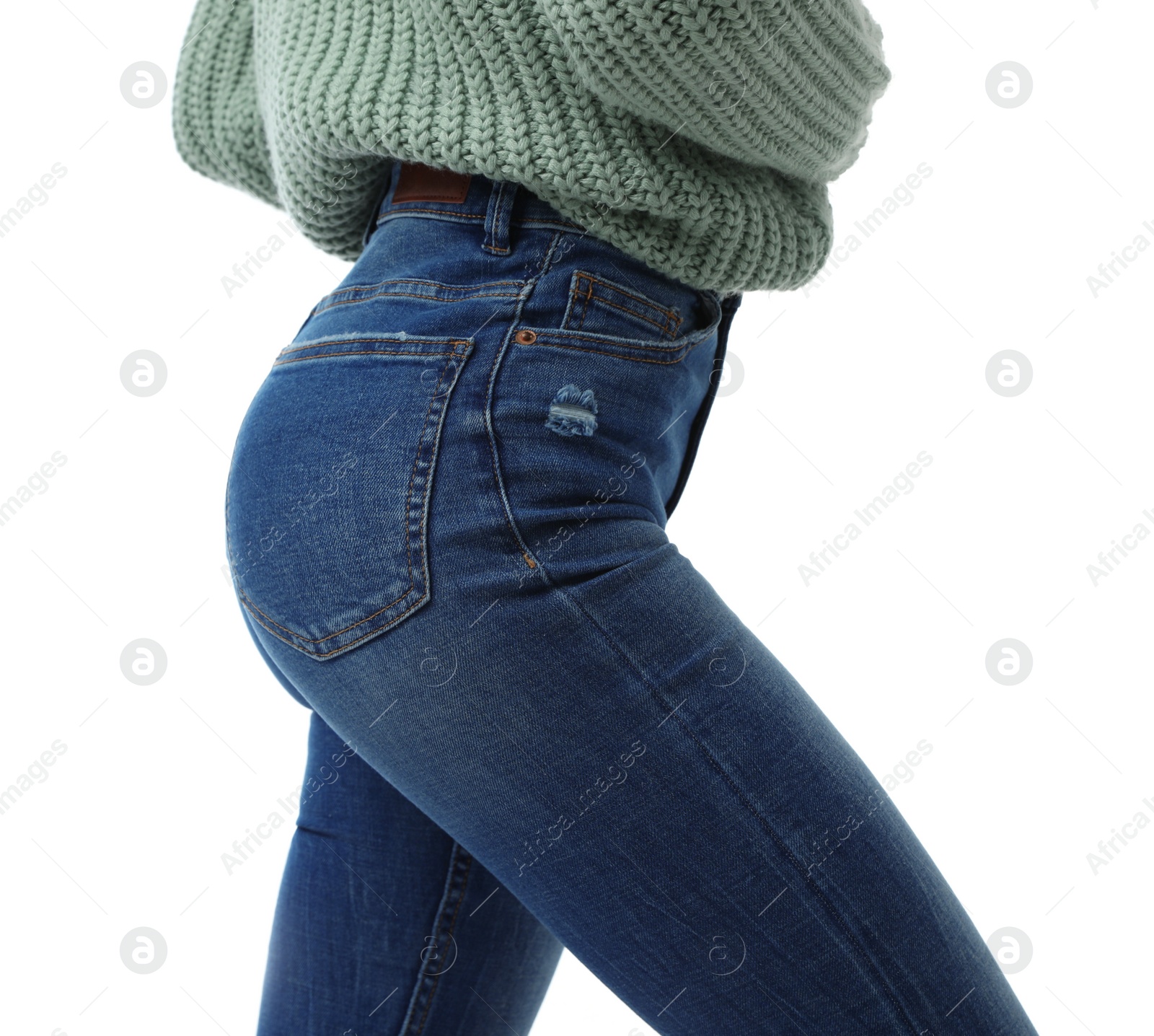 Photo of Woman wearing jeans on white background, closeup