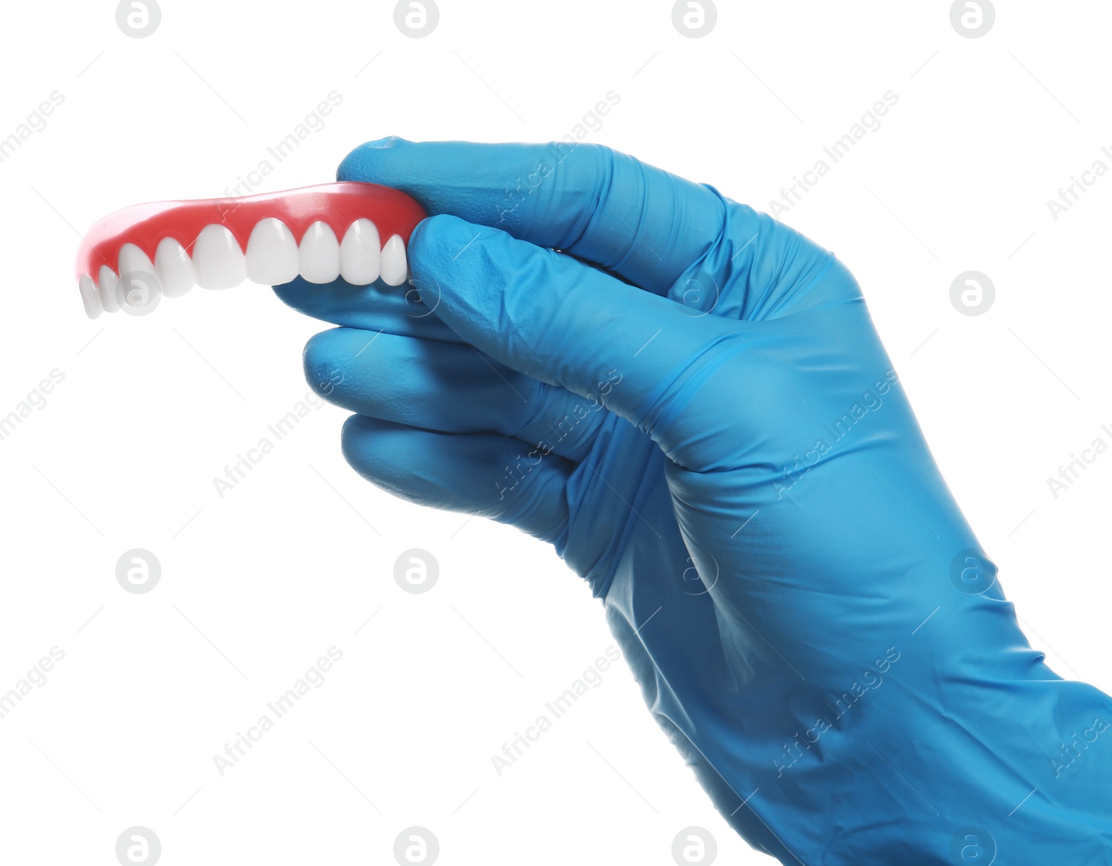 Photo of Dentist holding teeth cover on white background