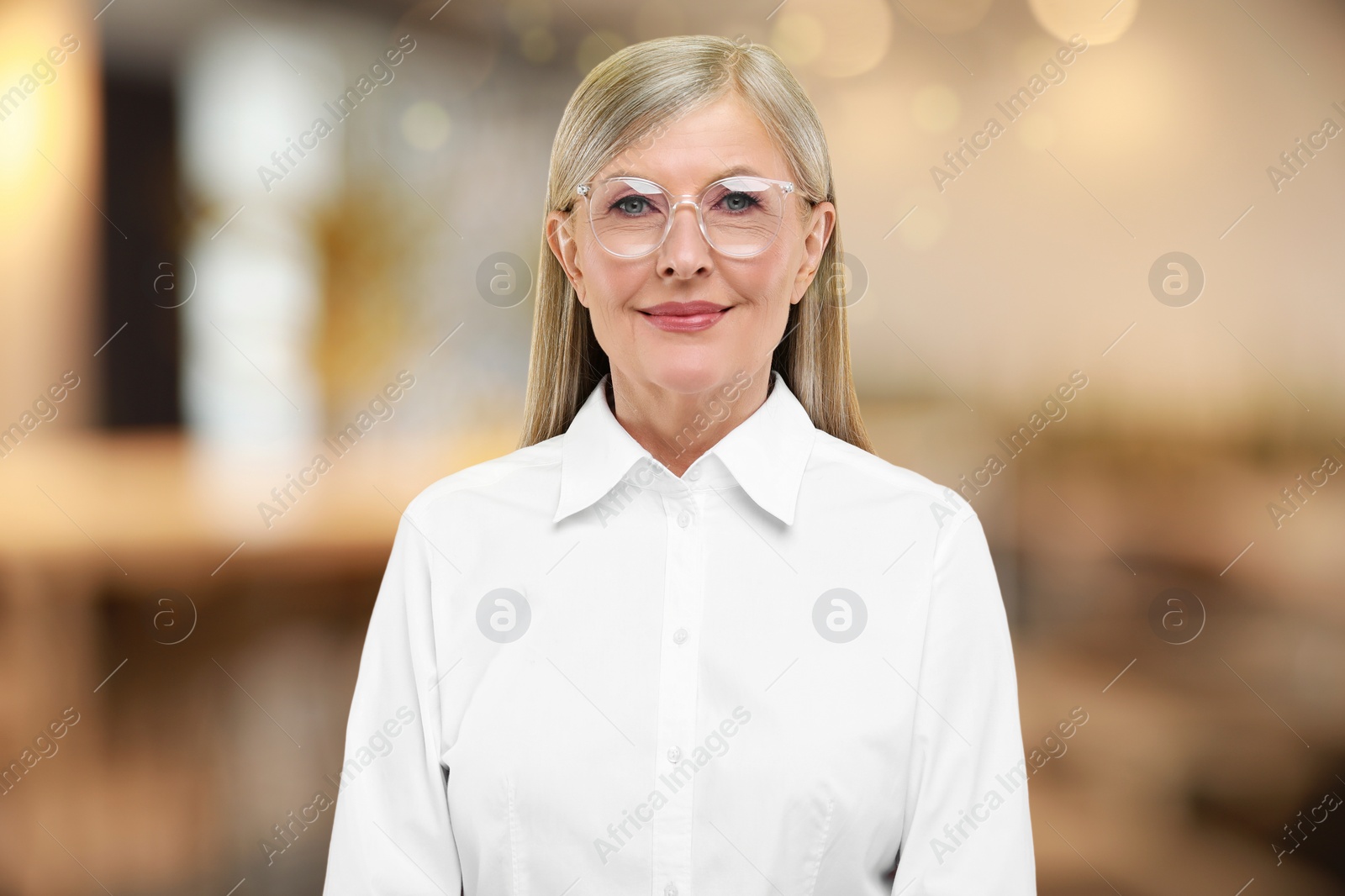 Image of Portrait of confident woman on blurred background