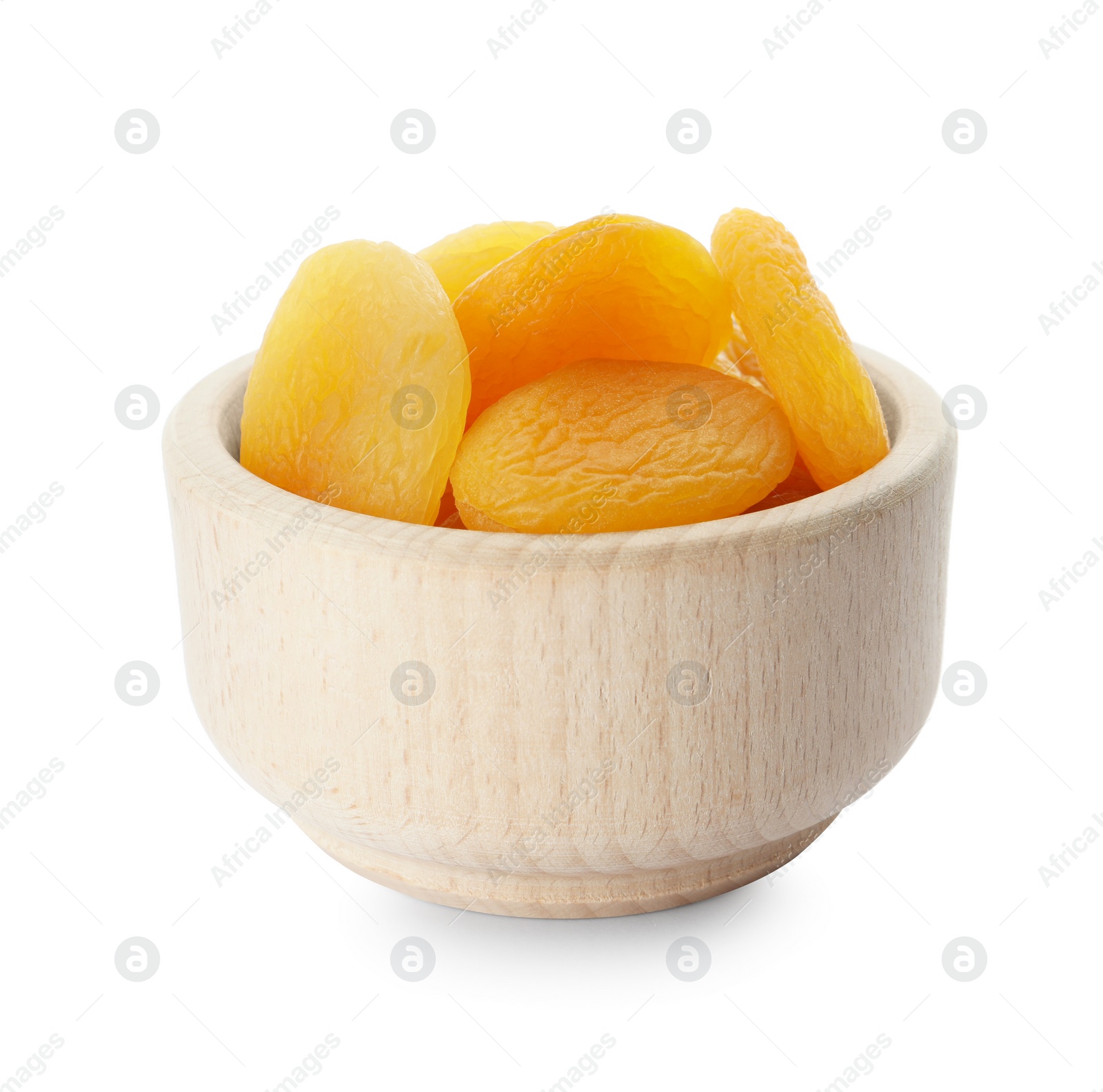 Photo of Ceramic bowl with tasty dried apricots isolated on white