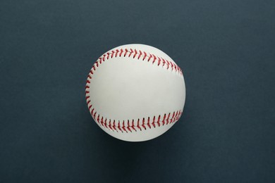Photo of Baseball ball on dark background, top view. Sports game