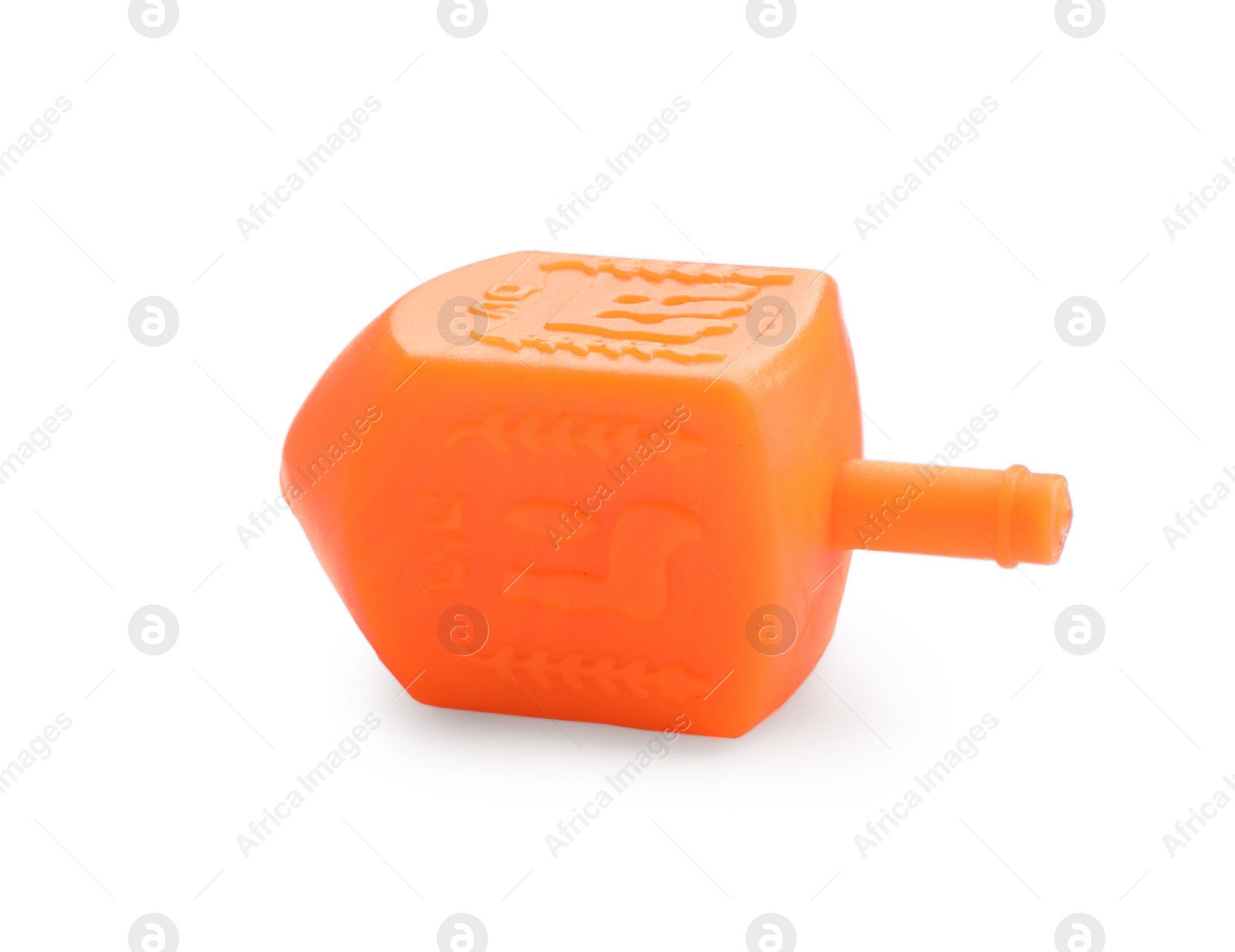 Photo of One orange dreidel isolated on white. Traditional Hanukkah game