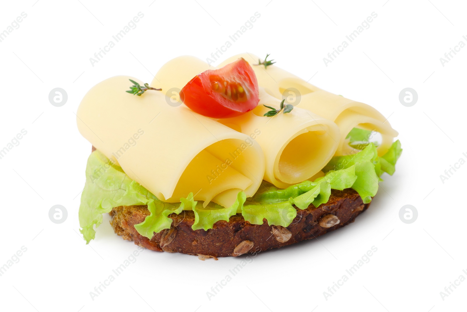 Photo of Tasty sandwich with slices of fresh cheese, tomato, thyme and lettuce isolated on white