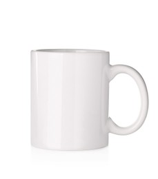 Photo of New blank ceramic mug isolated on white