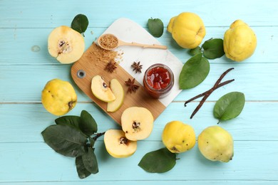 Photo of Composition with delicious quince jam and fruits on light blue wooden table, flat lay