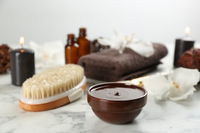 Photo of Composition with cosmetic product for spa body wraps on white marble background