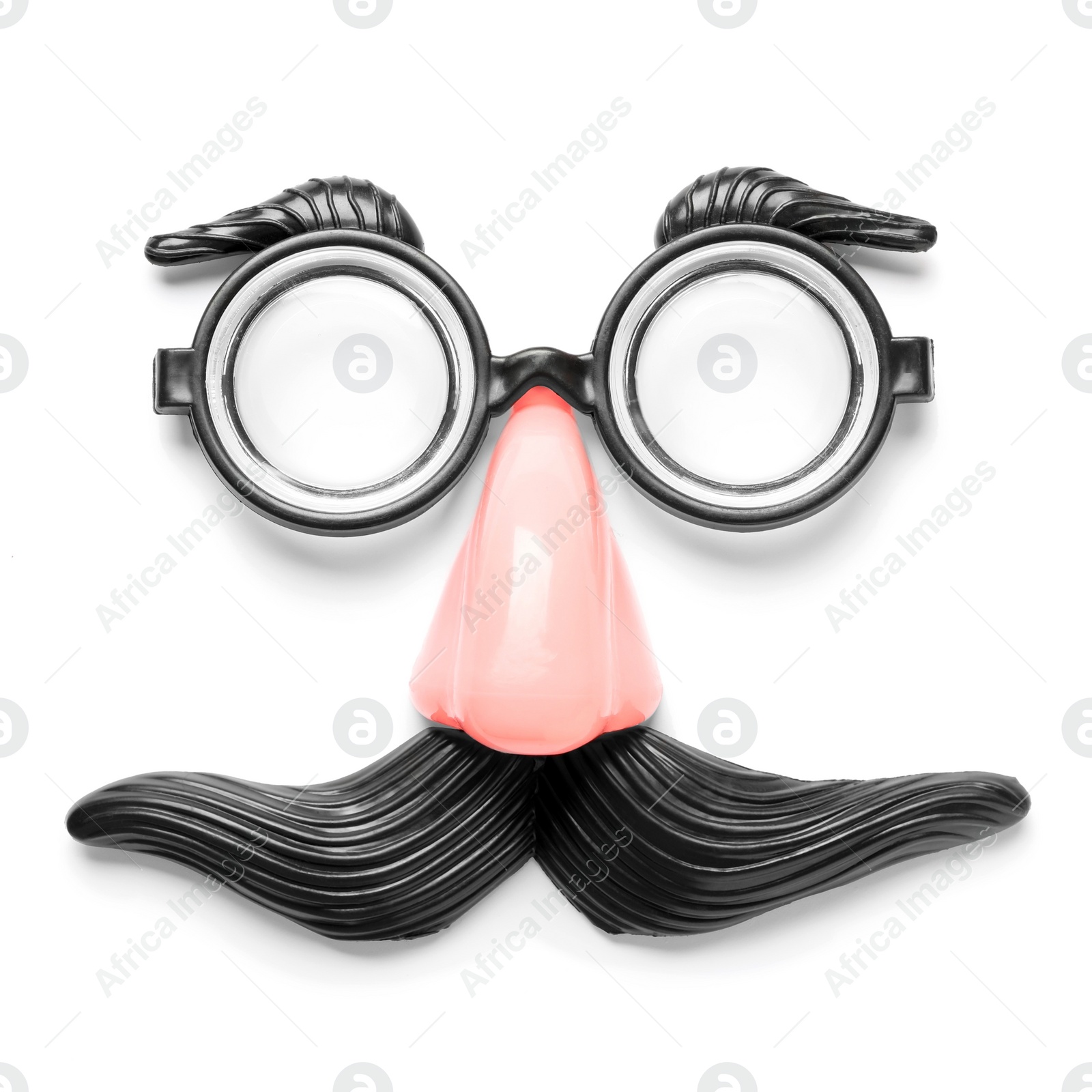 Photo of Funny face made with clown's accessories on white background, top view