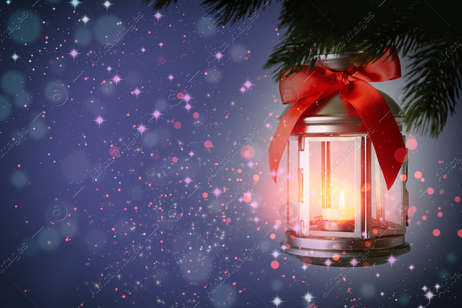 Image of Christmas lantern with candle hanging on fir tree branch, space for text. Magical atmosphere 