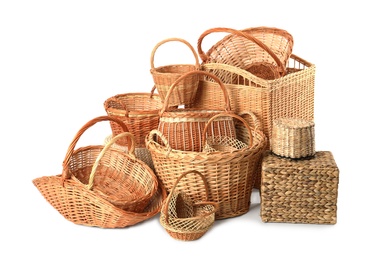 Photo of Many different wicker baskets isolated on white