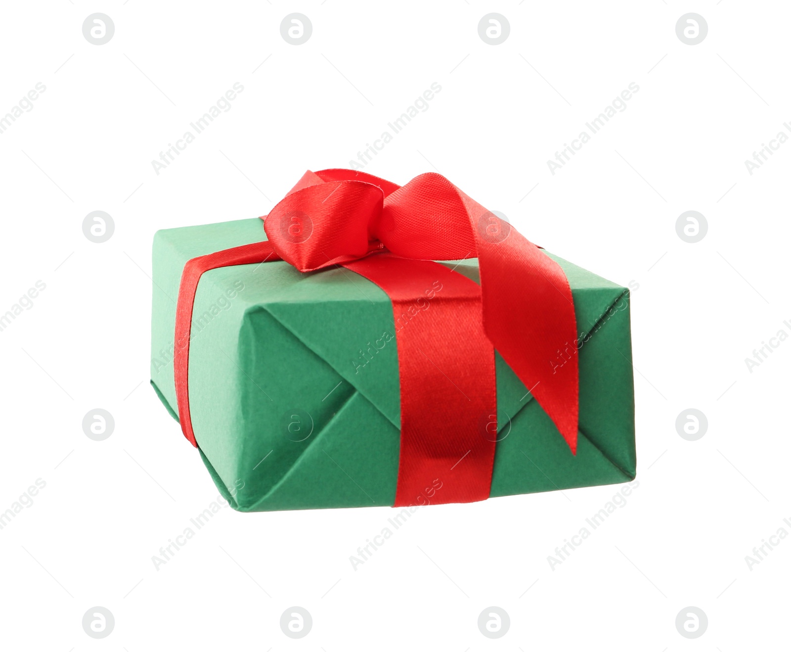 Photo of Green gift box with red bow isolated on white