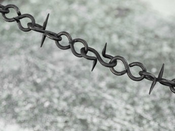 Photo of Beautiful black chain with spikes on grey background