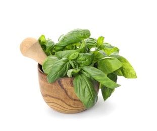 Mortar with fresh green basil leaves on white background