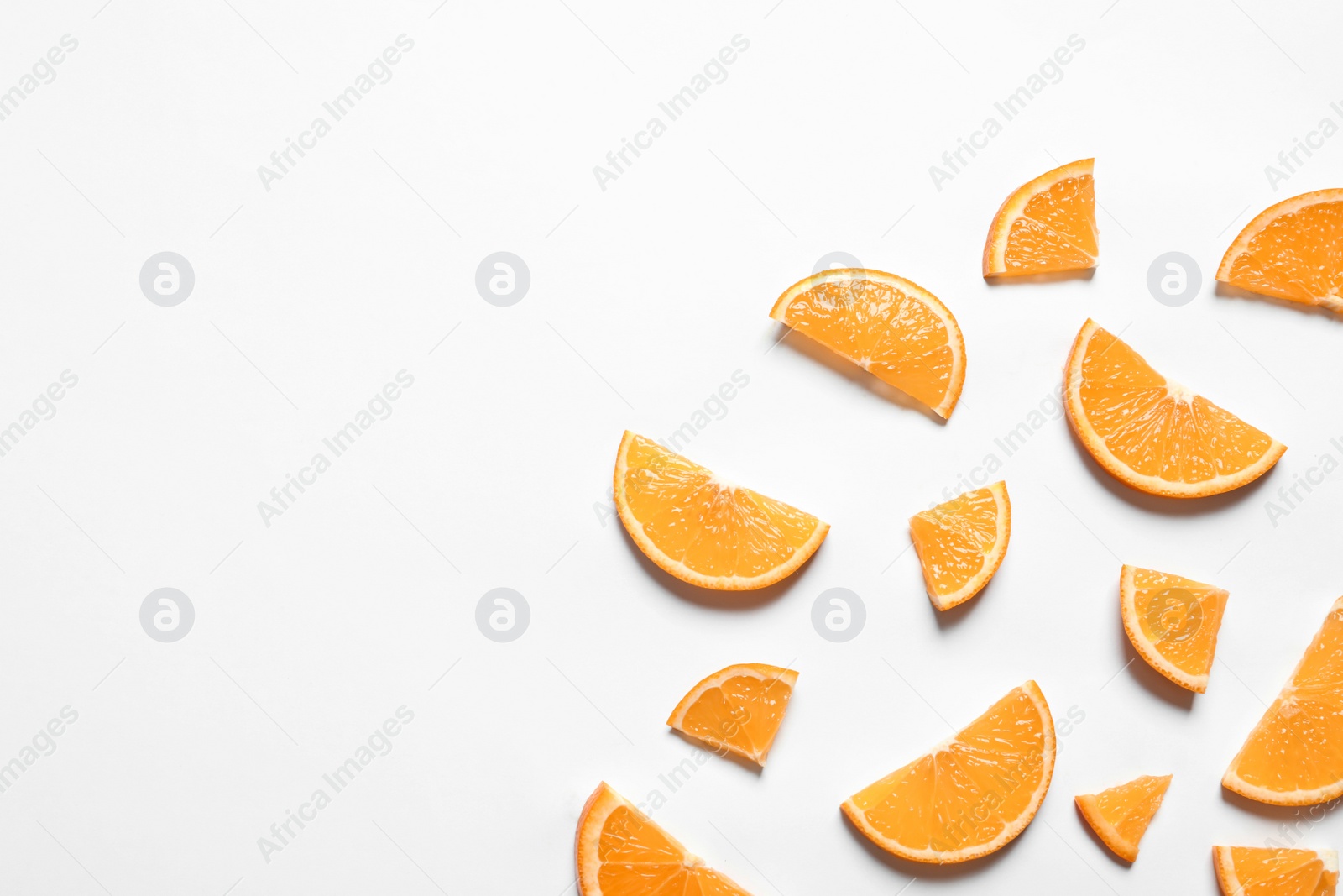 Photo of Composition with orange slices on white background, top view