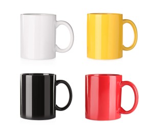 Image of Set with different ceramic mugs on white background 