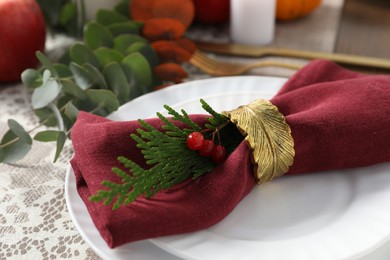 Photo of Beautiful autumn table setting with floral decor, closeup