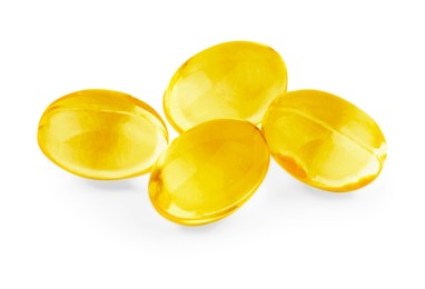 Photo of Many vitamin capsules isolated on white. Health supplements