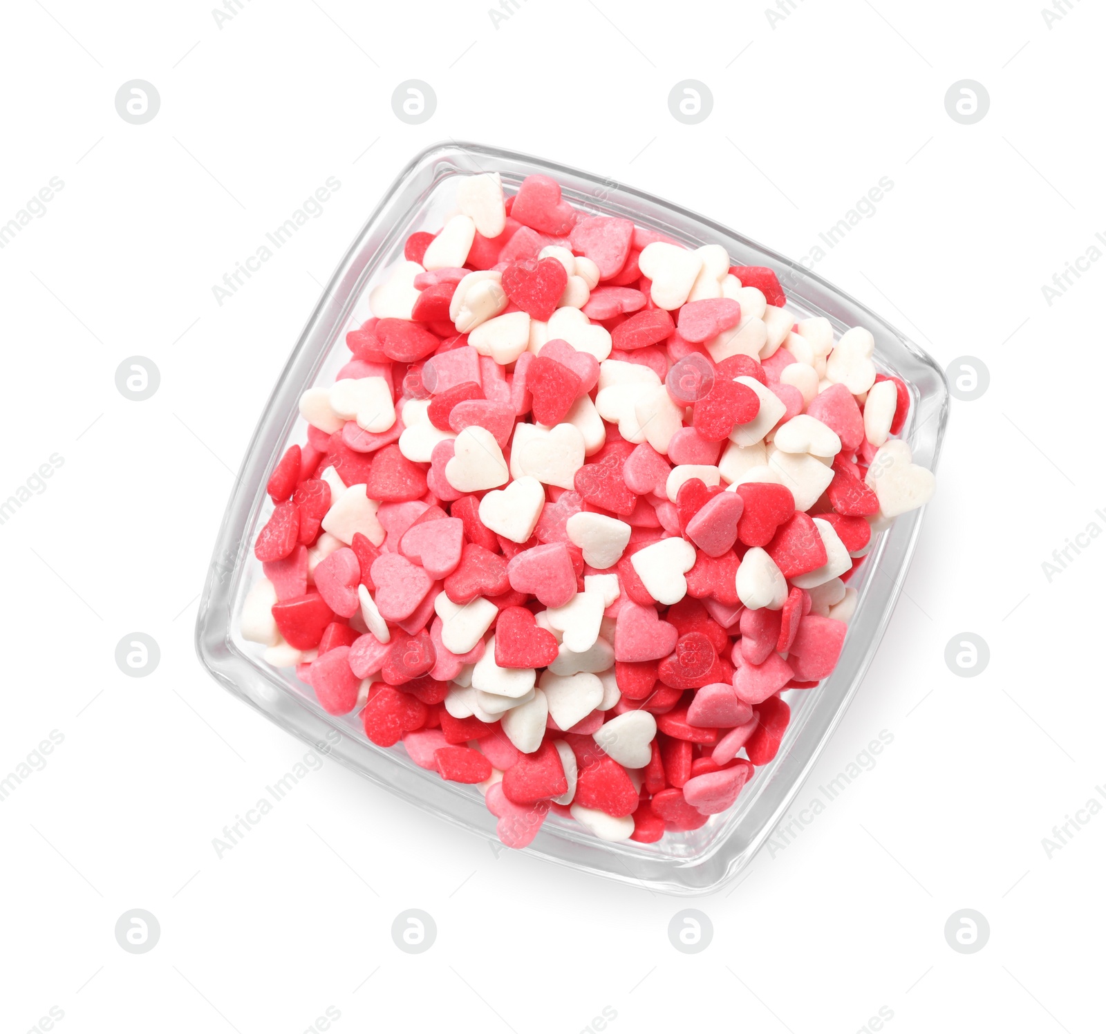 Photo of Sweet candy hearts in bowl on white background, top view