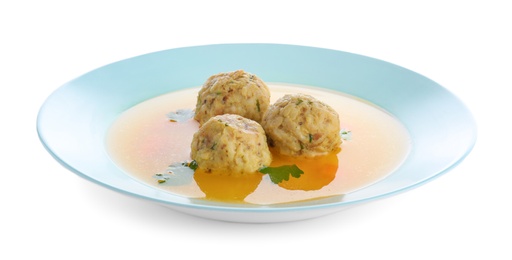 Dish of Jewish matzoh balls soup isolated on white