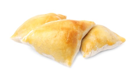 Photo of Delicious samosas isolated on white. Homemade pastry
