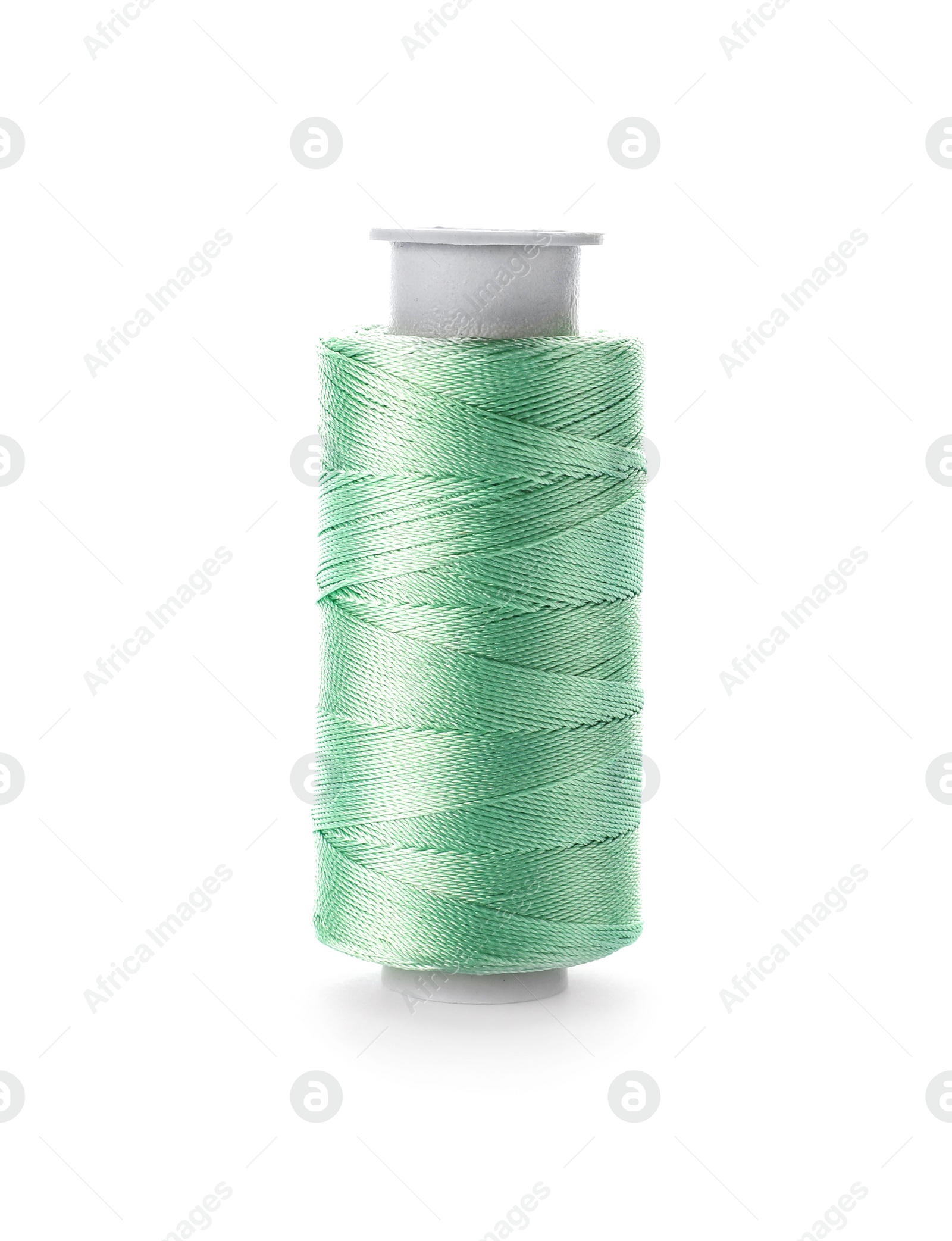 Photo of Color sewing thread on white background