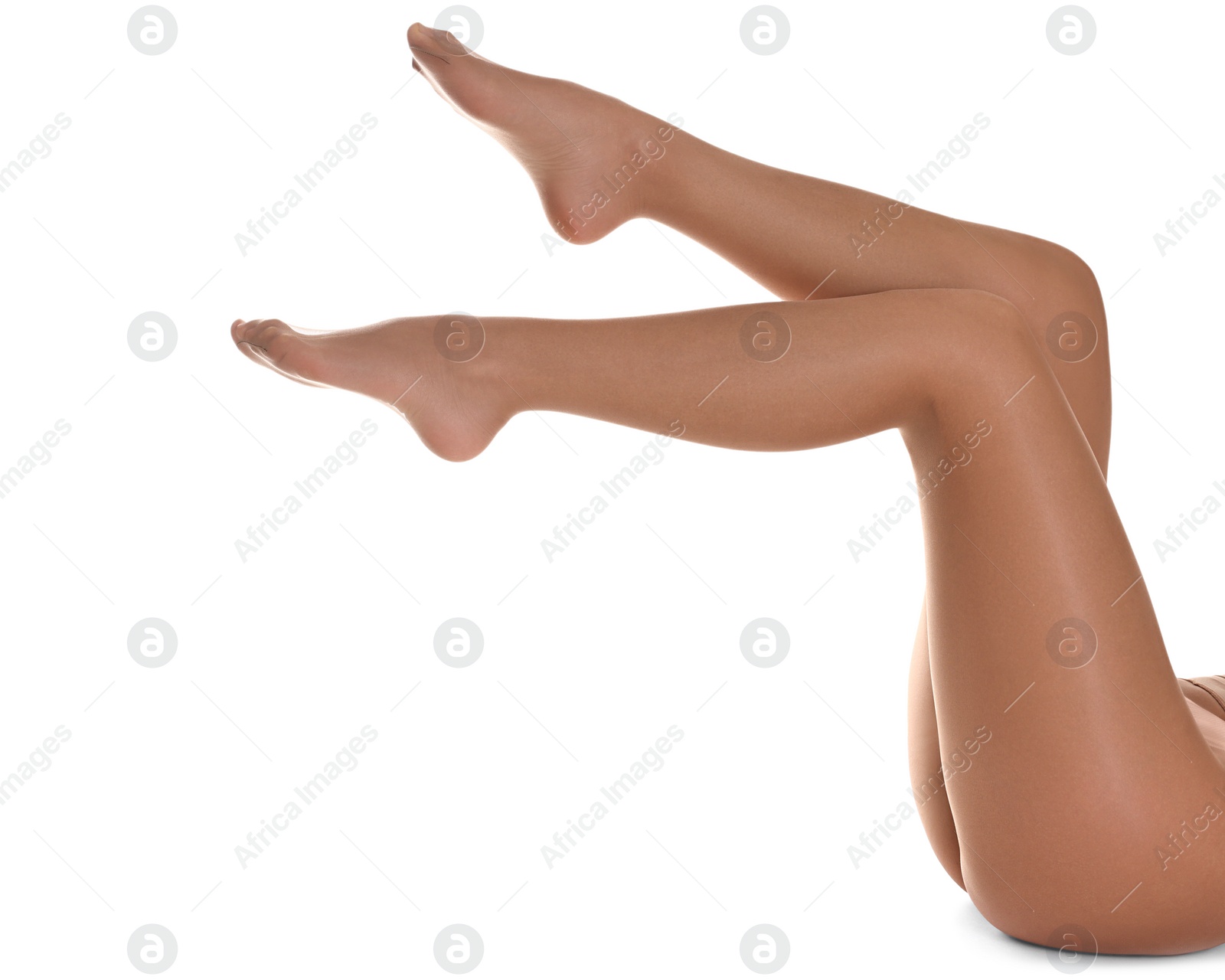 Photo of Woman with beautiful long legs wearing tights on white background, closeup