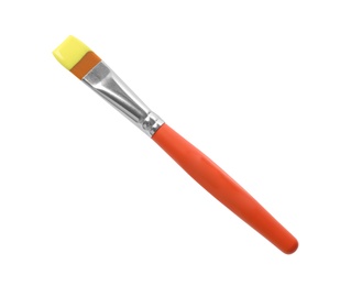 Photo of Brush with color paint on white background, top view