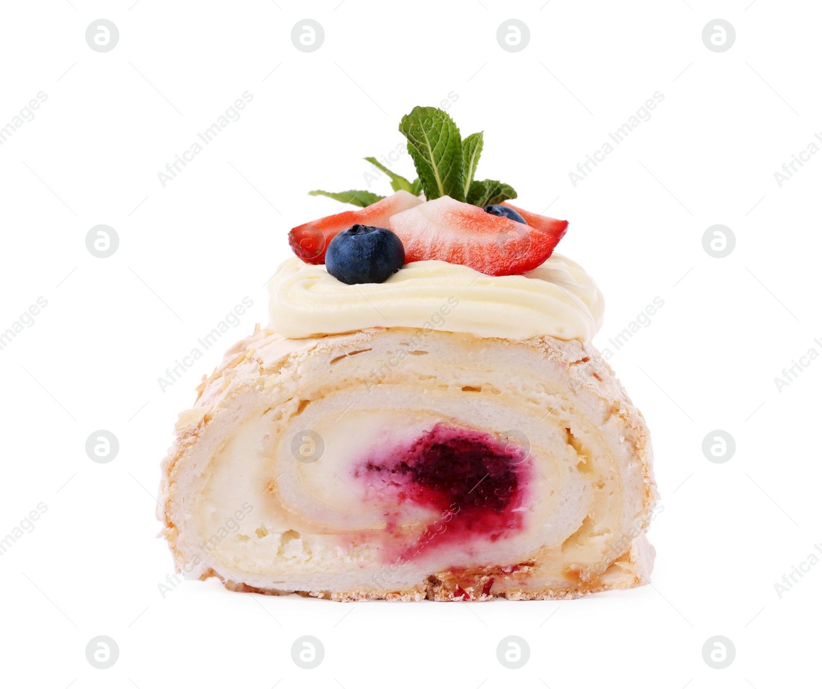 Photo of Tasty meringue roll with jam, berries and mint leaves isolated on white