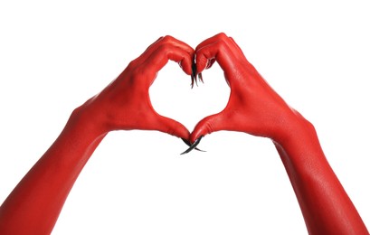 Photo of Scary monster making heart gesture on white background, closeup of hands. Halloween character