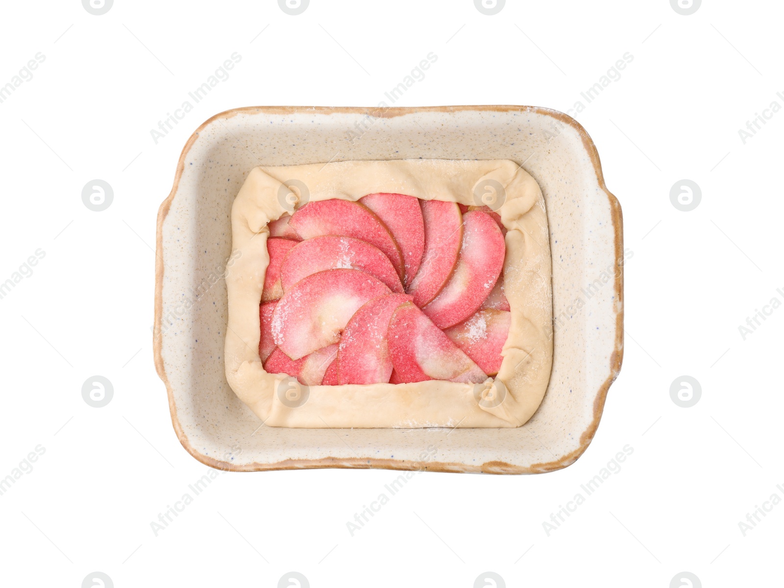 Photo of Baking dish with fresh dough and apples isolated on white, top view. Making galette