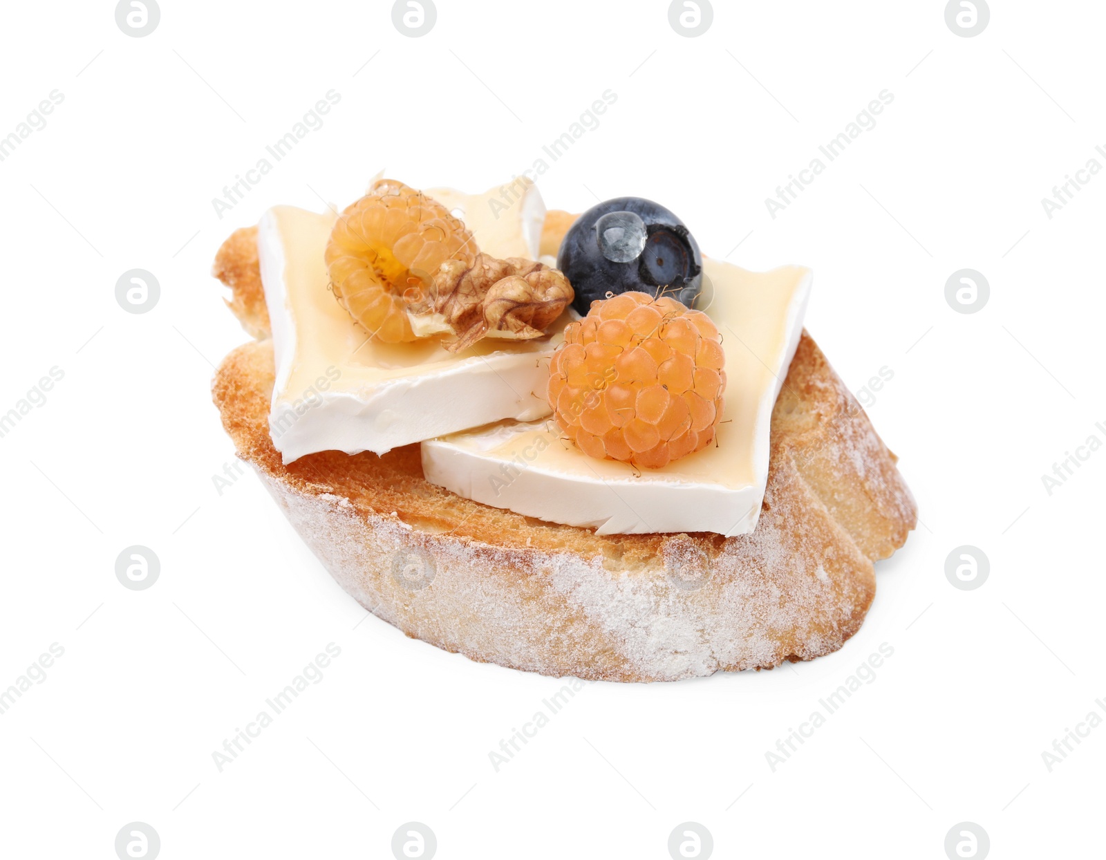 Photo of Tasty sandwich with brie cheese, fresh berries and walnut isolated on white