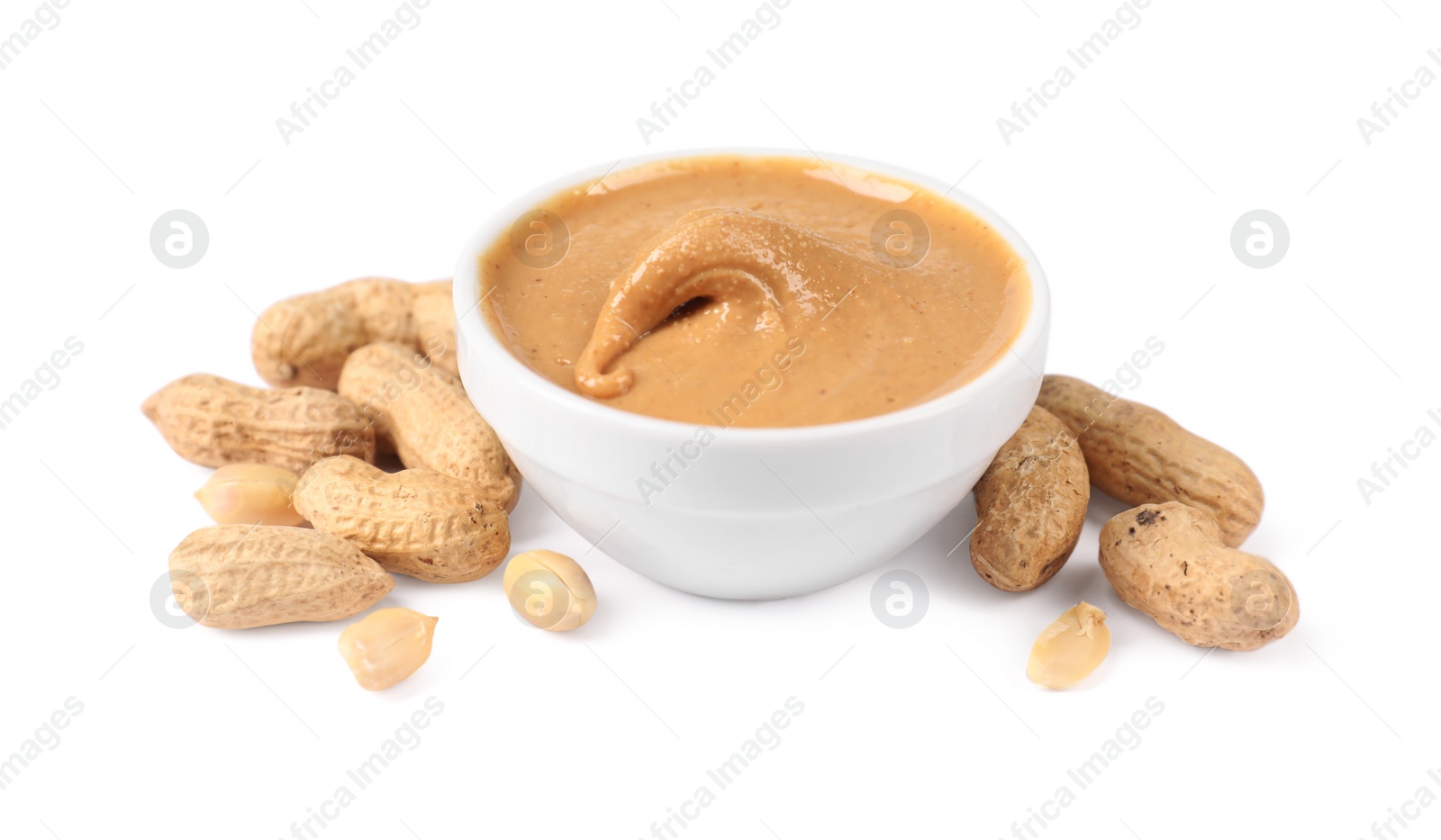 Photo of Delicious nut butter and peanuts isolated on white