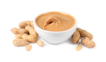 Photo of Delicious nut butter and peanuts isolated on white