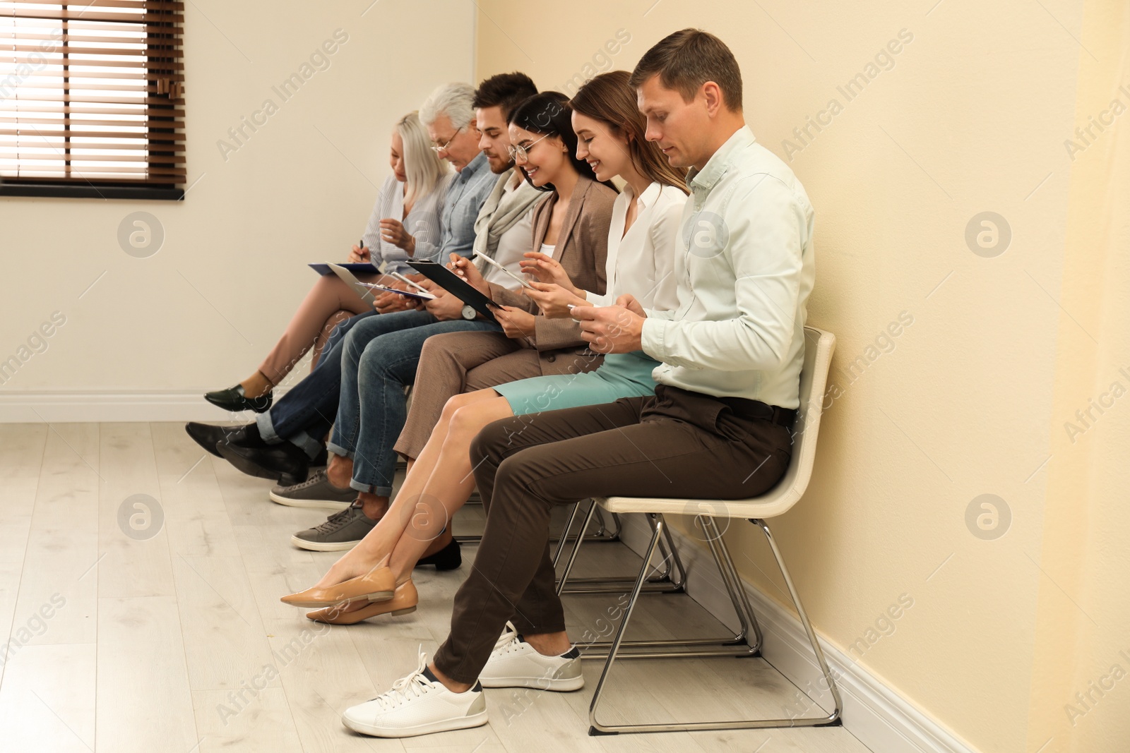 Photo of People waiting for job interview in office