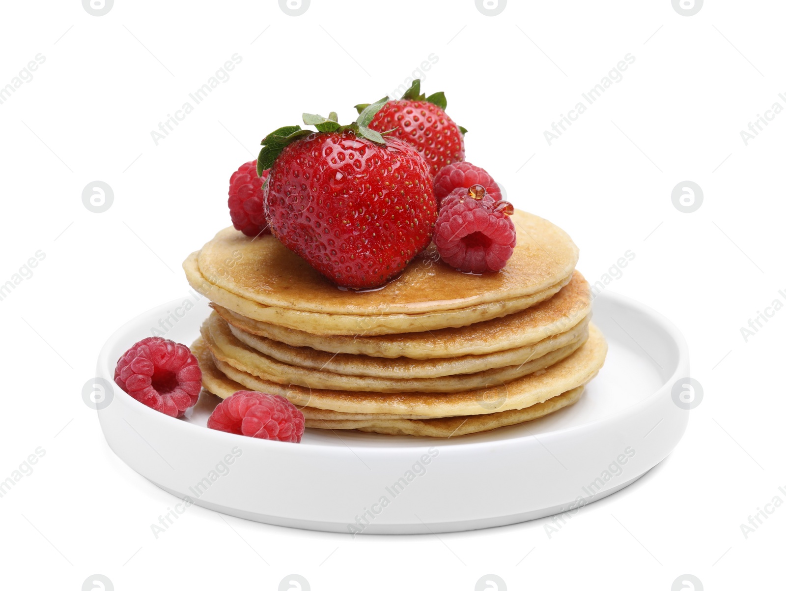 Photo of Tasty pancakes with fresh berries and honey on white background