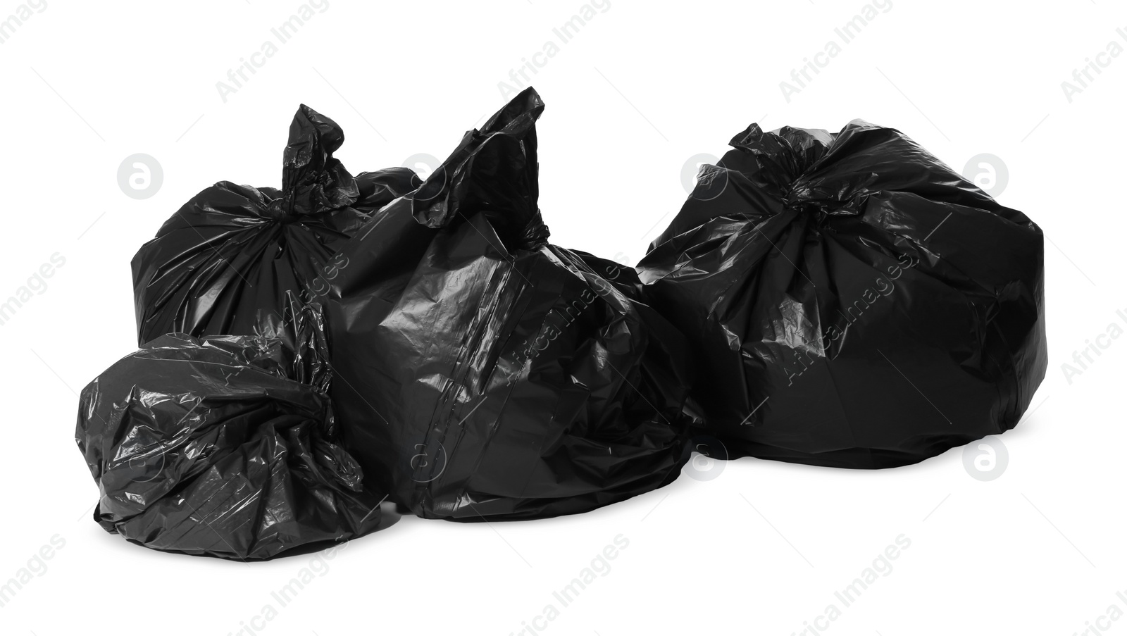 Photo of Trash bags full of garbage isolated on white