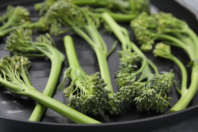 Fresh raw broccolini in pan, closeup. Healthy food