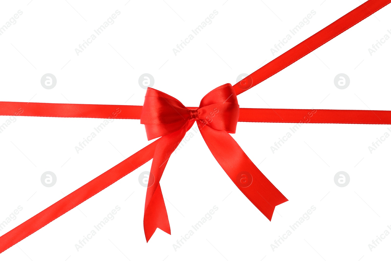 Photo of Red ribbon with bow on white background. Festive decoration