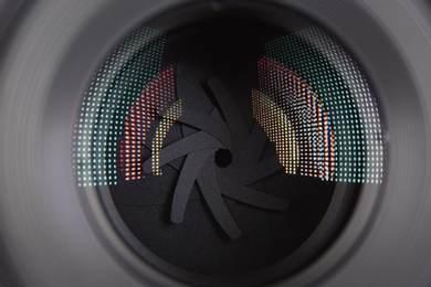 Camera lens of professional photographer, closeup view