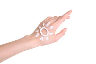 Young woman applying hand cream against on white background