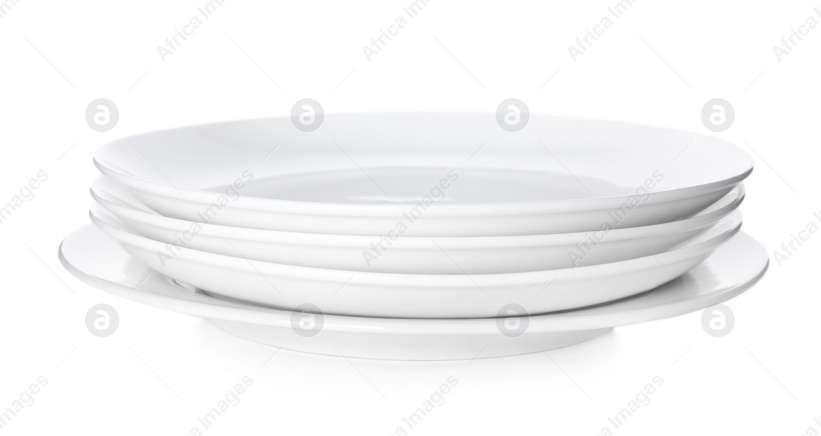 Photo of Stack of ceramic plates isolated on white