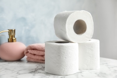 Photo of Toilet paper rolls on table. Personal hygiene