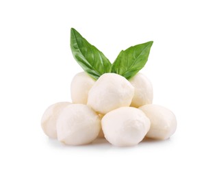 Photo of Tasty mozzarella balls and basil leaves isolated on white