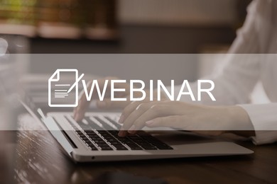 Webinar concept. Woman working with laptop at table indoors, closeup